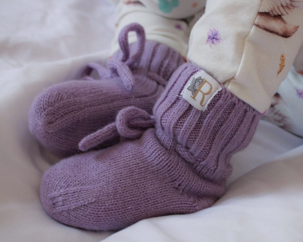 Merinowollen babysofjes in de lieve kleur lila