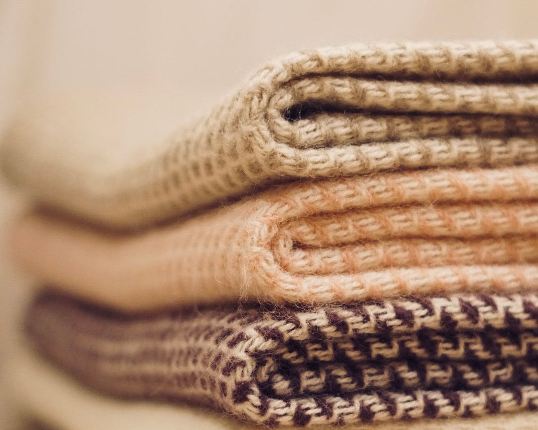 Wollen wiegen deken in lieve kleurtjes