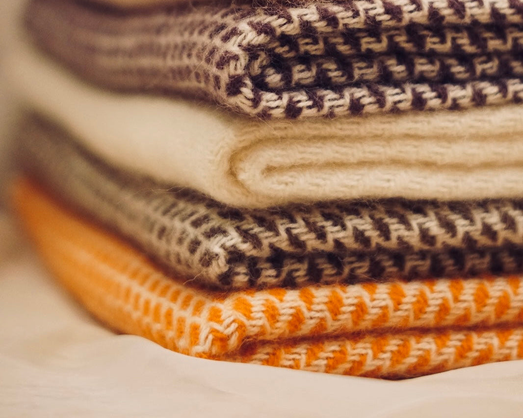 wollen wiegendeken in verschillende lieve kleurtjes