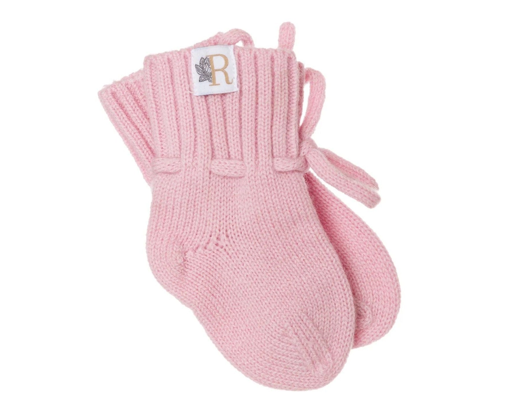 Handgebreide merinowollen babyslofjes in roze met koordje
