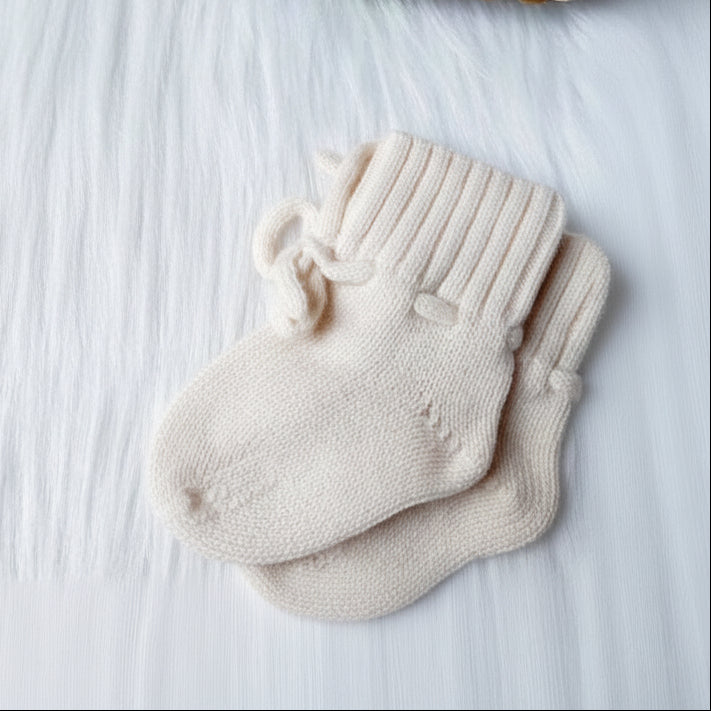 Baby booties & hat | 
 Cream
