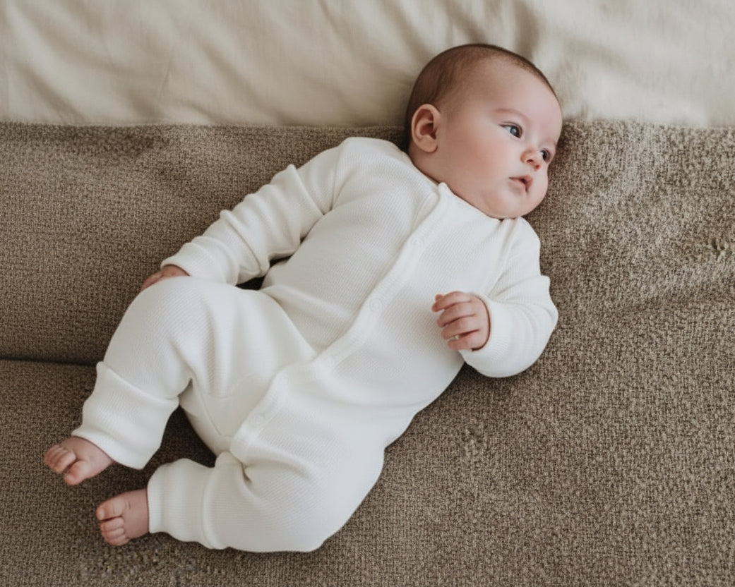 Merinowol boxpakje met voetjes in de kleur wit