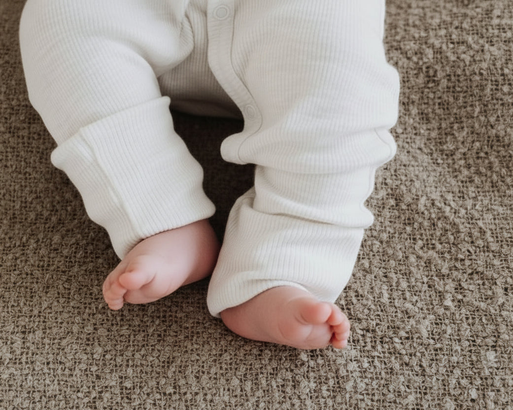 Merinowol boxpakje met voetjes in de kleur wit