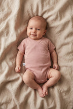 Short-sleeved crossover romper - Merino wool | Misty Rose