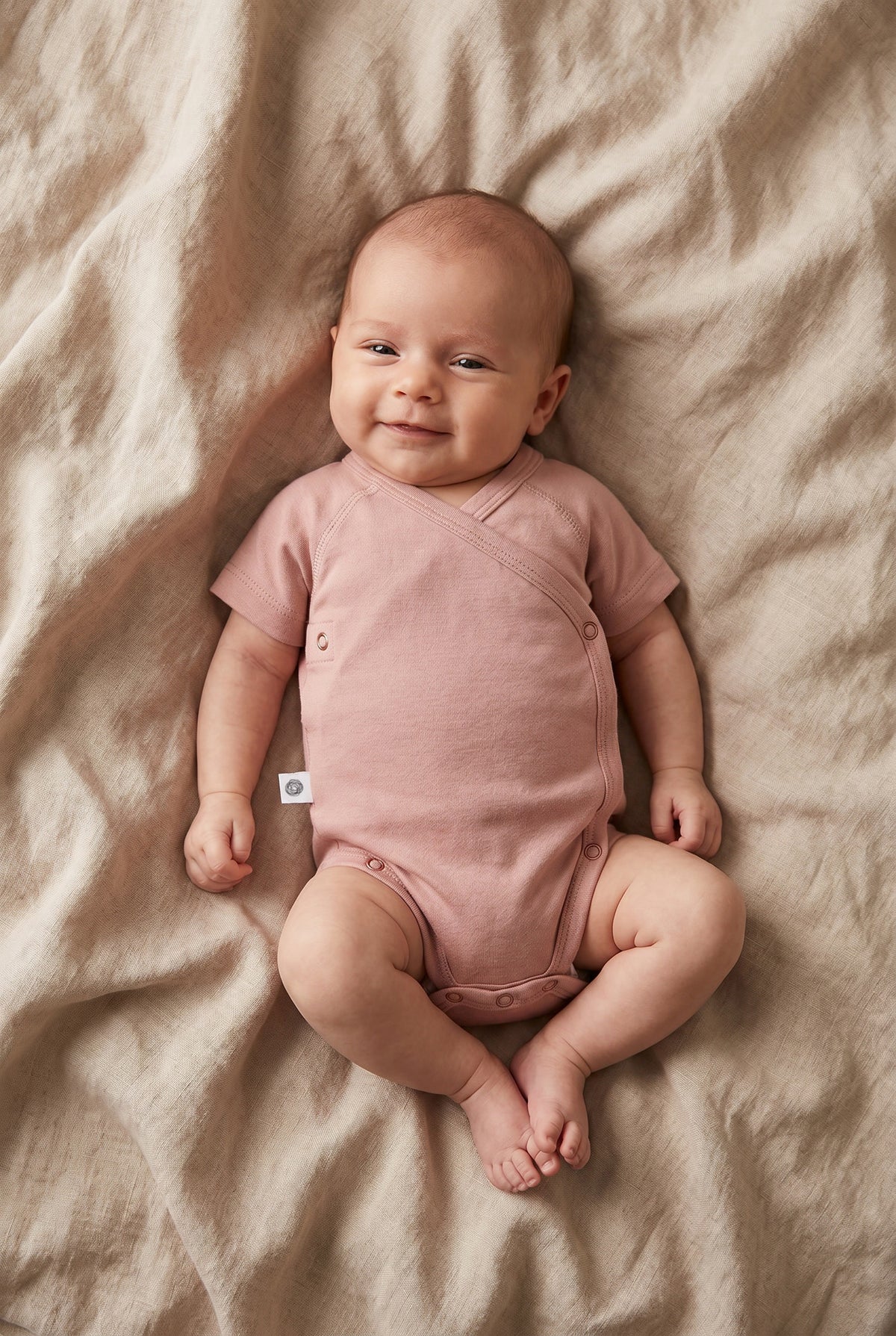 Short-sleeved crossover romper - Merino wool | Misty Rose
